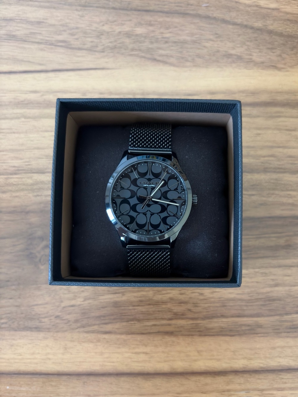 Black coach watch